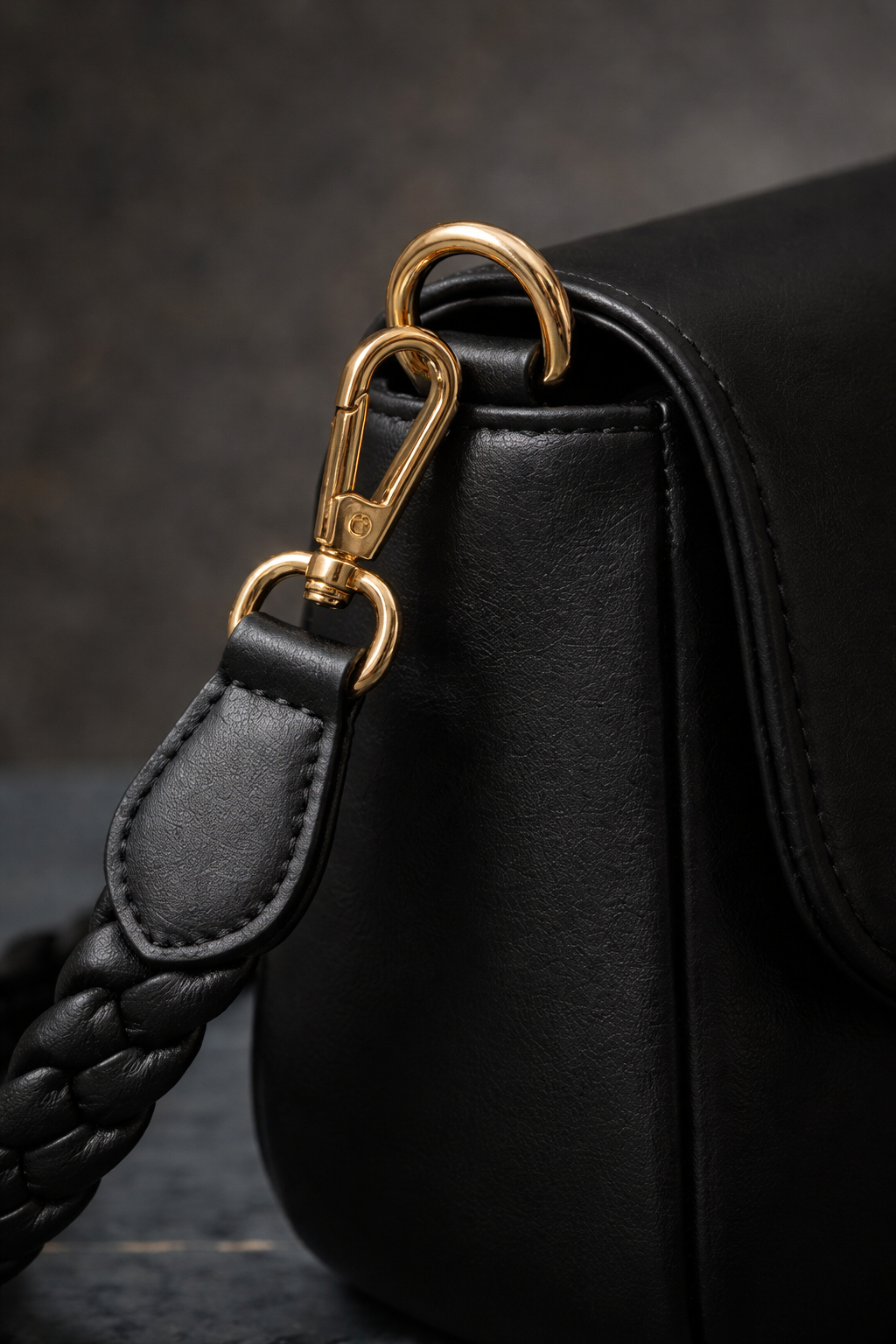 Bagistry Glaze & Go Mini black shoulder bag close up of braided strap and gold hardware, premium detail women’s handbag